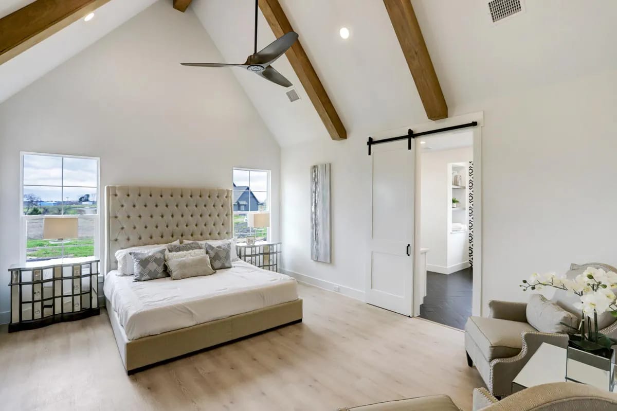4-Bedroom Modern Farmhouse House Plan with a Vaulted Great Room and Bonus Room (2,877 Sq. Ft. Floor Plan) 10 primary suite under three beams and a vault off nine-foot walls 1