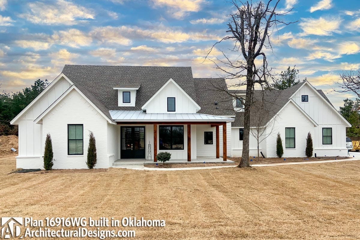 3-Bedroom New American Farmhouse House Plan with an L-Shaped Front Porch (1,988 Sq. Ft. Floor Plan) 11 six feet of front porch is a chair and a walkway 1