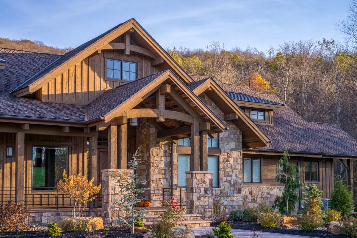 3-Bedroom Mountain Ranch House Plan with an Optional Finished Lower Level (3,623 Sq. Ft. Floor Plan) 11 stone piers, heavy timber, and a vaulted front porch 13 by 14 1