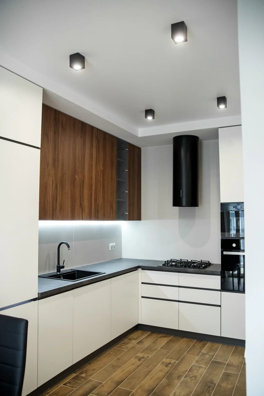 the cabinet timber decides everything else in a warm minimalist kitchen 1