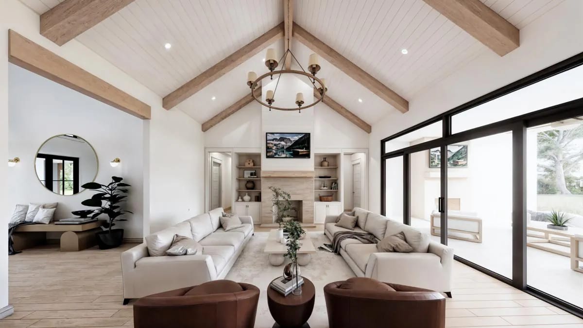 4-Bedroom Modern Farmhouse House Plan with an Outdoor Kitchen and Fireplace on a 44-Foot Porch (3,877 Sq. Ft. Floor Plan) 10 the great room vaults to 19 feet under a boarded ceiling 1
