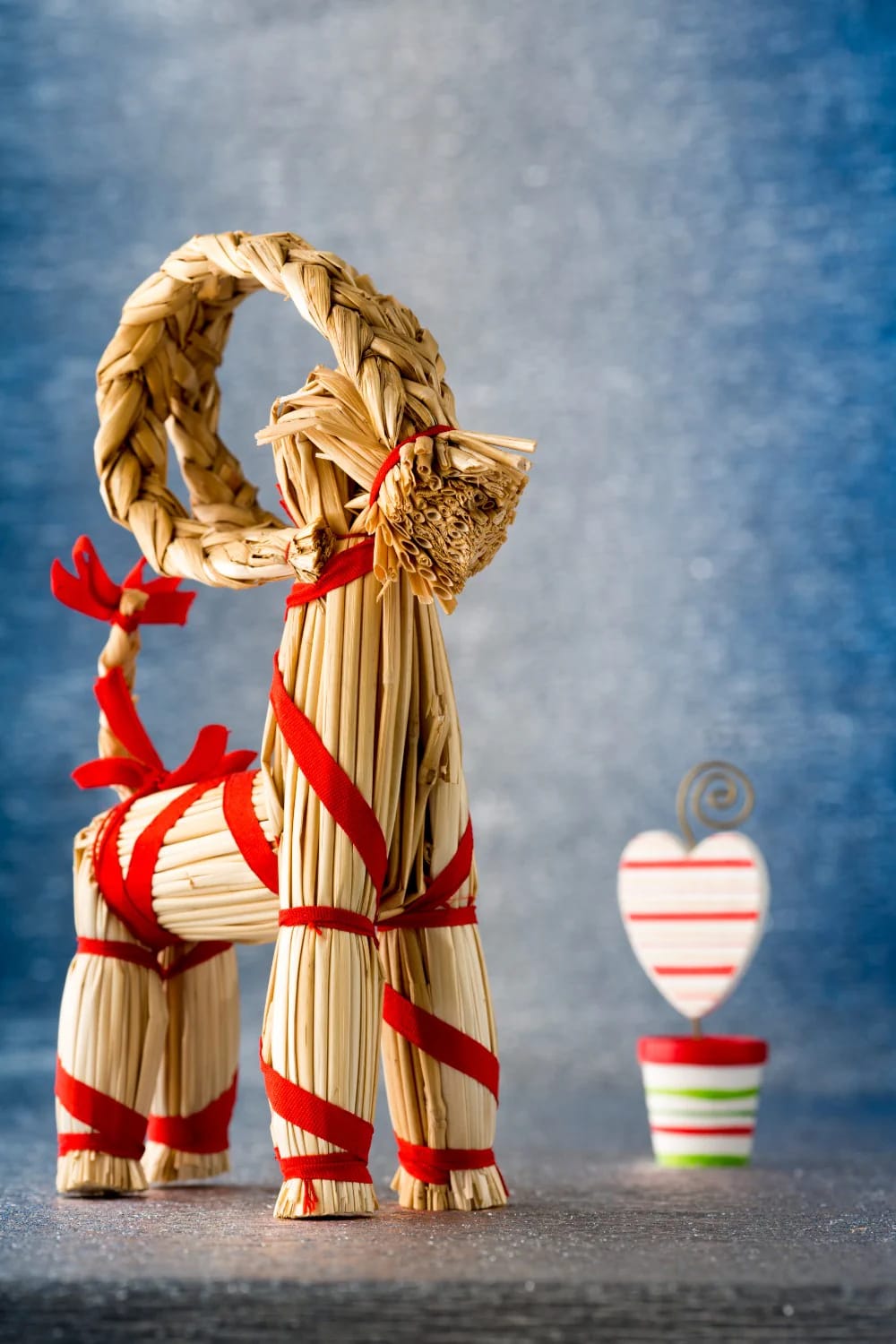 Scandinavian Christmas Decor With Pale Wood and Straw Ornaments That Reads Nordic, Not Rustic 10 the julbock works small, on a table, not knee-high by the door 1