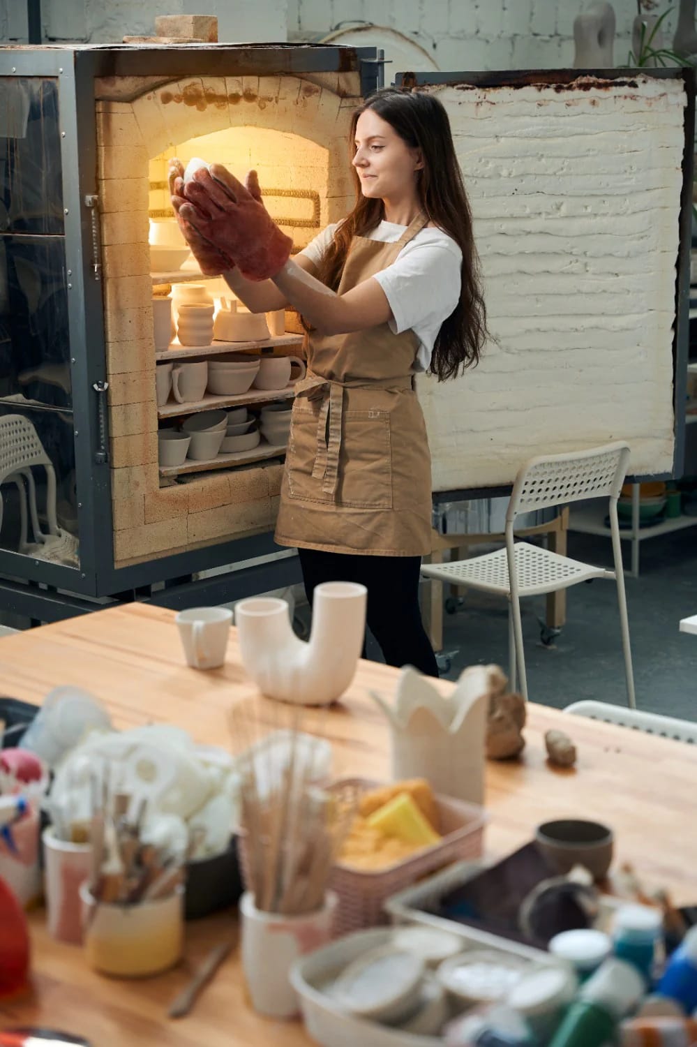 Pottery Studio Ideas That Hold Up Once There's Clay in the Room 14 the kiln decides the room, not the other way round 1