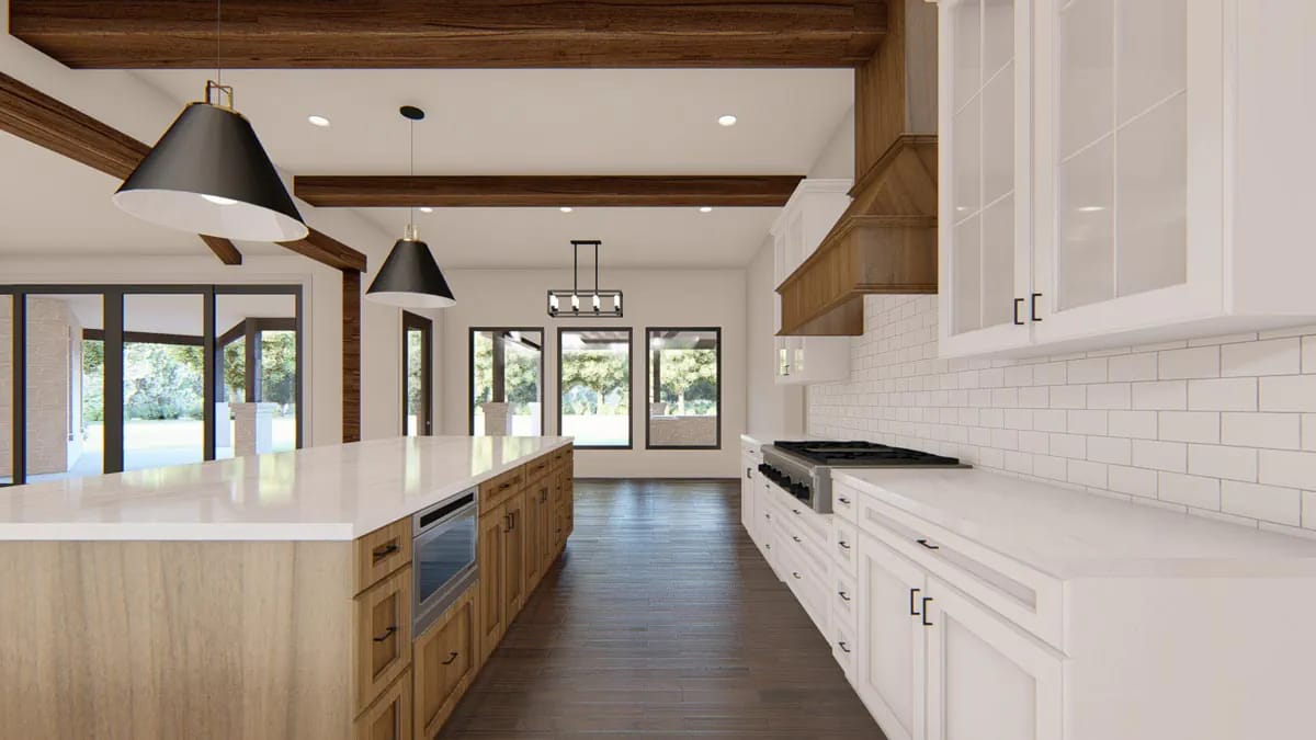 the kitchen is 16 by 20 feet with a full-length island and an oak hood 1