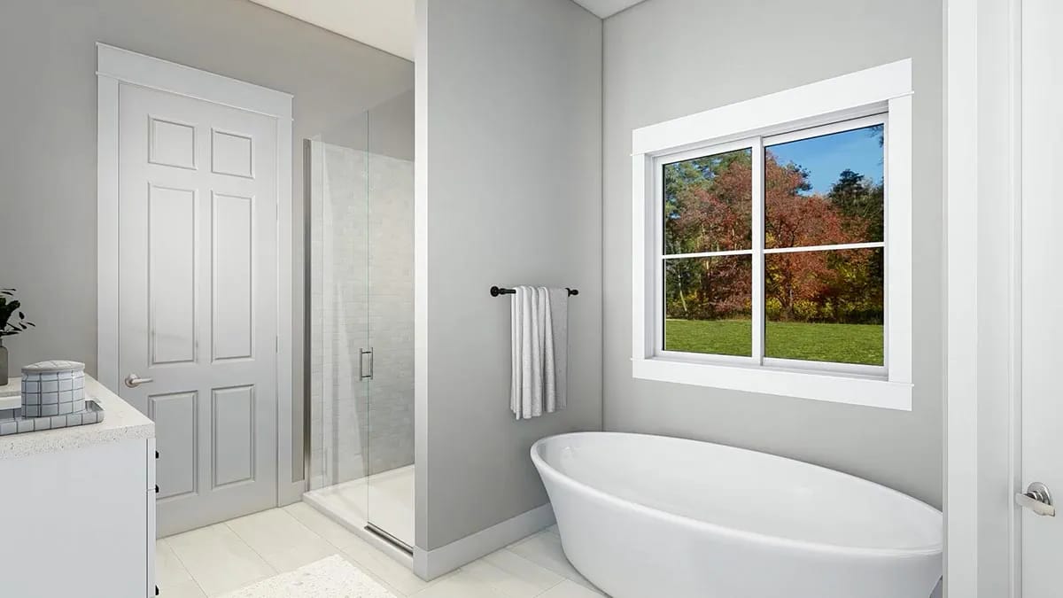 the master bath spends its wall on the tub, not the shower 1