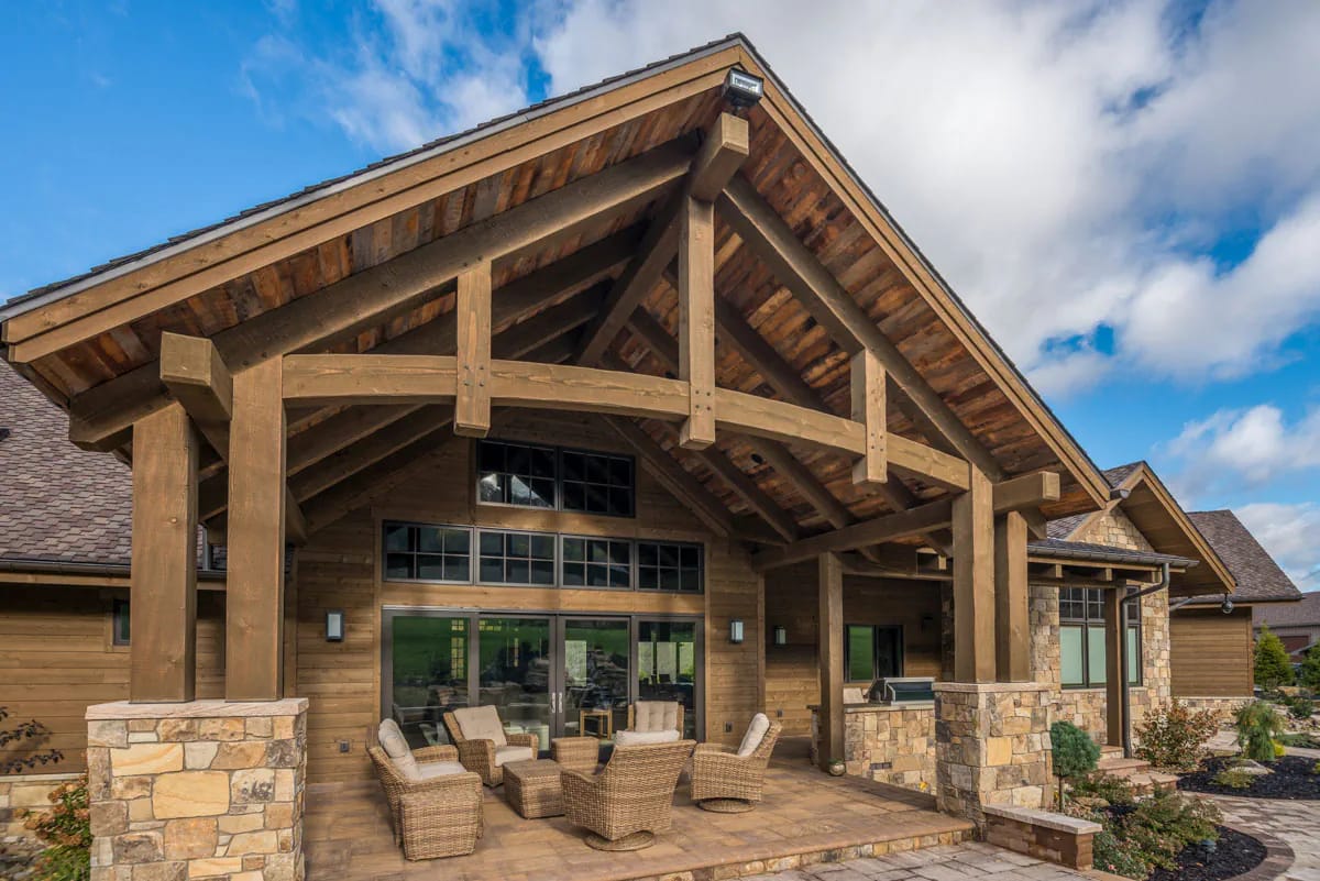 3-Bedroom Mountain Ranch House Plan with an Optional Finished Lower Level (3,623 Sq. Ft. Floor Plan) 8 the vaulted covered patio: timber truss, stone piers, 23 by 16 feet 1