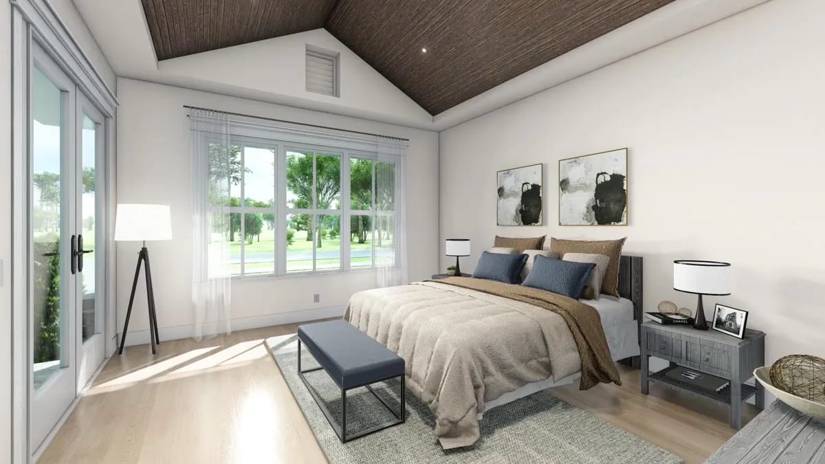 Bright contemporary bedroom with vaulted wood ceiling, large windows, neutral bedding, and blue-gray accents