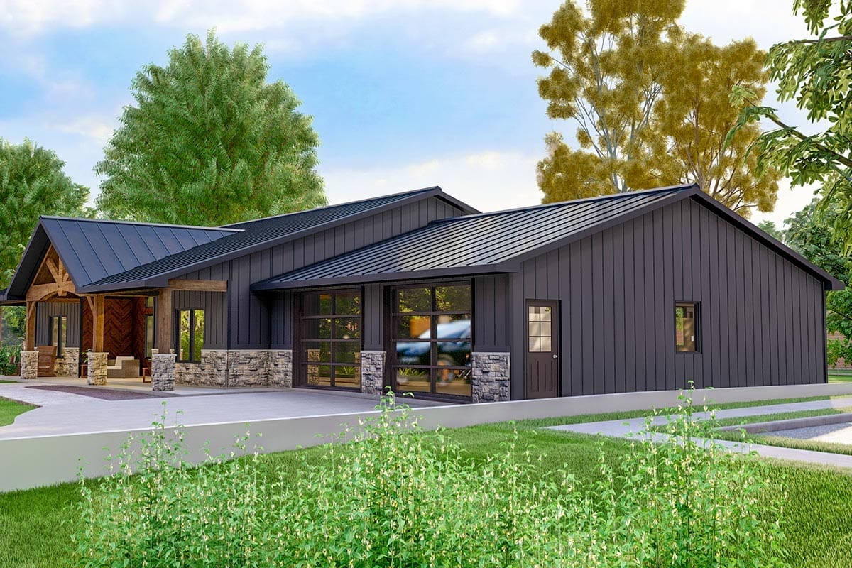 Contemporary barn-style home with dark metal gables, stone accents, and a covered timber entry porch