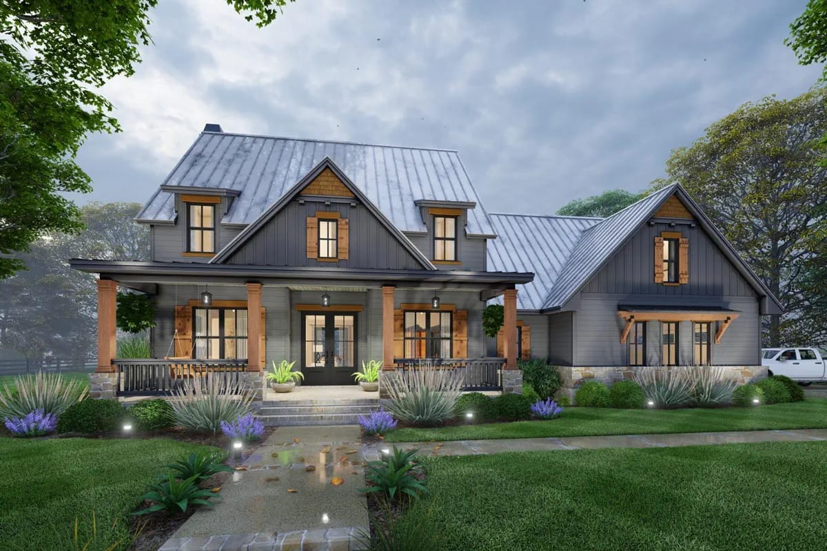 Front exterior render of a dark-sided home with metal gables, covered porch, timber columns, and landscaped walkway