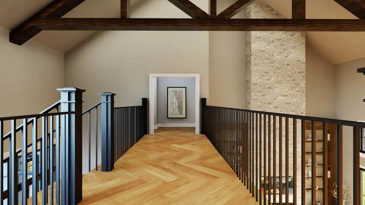 Gallery loft with herringbone wood floor, black railings, and exposed timber trusses overlooking living area Gallery loft with herringbone wood floor, black railings, and exposed timber trusses overlooking living area
