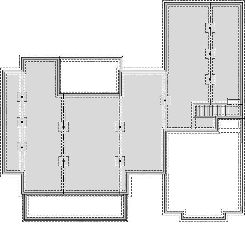 Modern Farmhouse Bonus Room Floor Plan Architectural floor plan showing the layout of a modern farmhouse plan with bonus room, including connected rooms, exterior walls, and a staircase area.