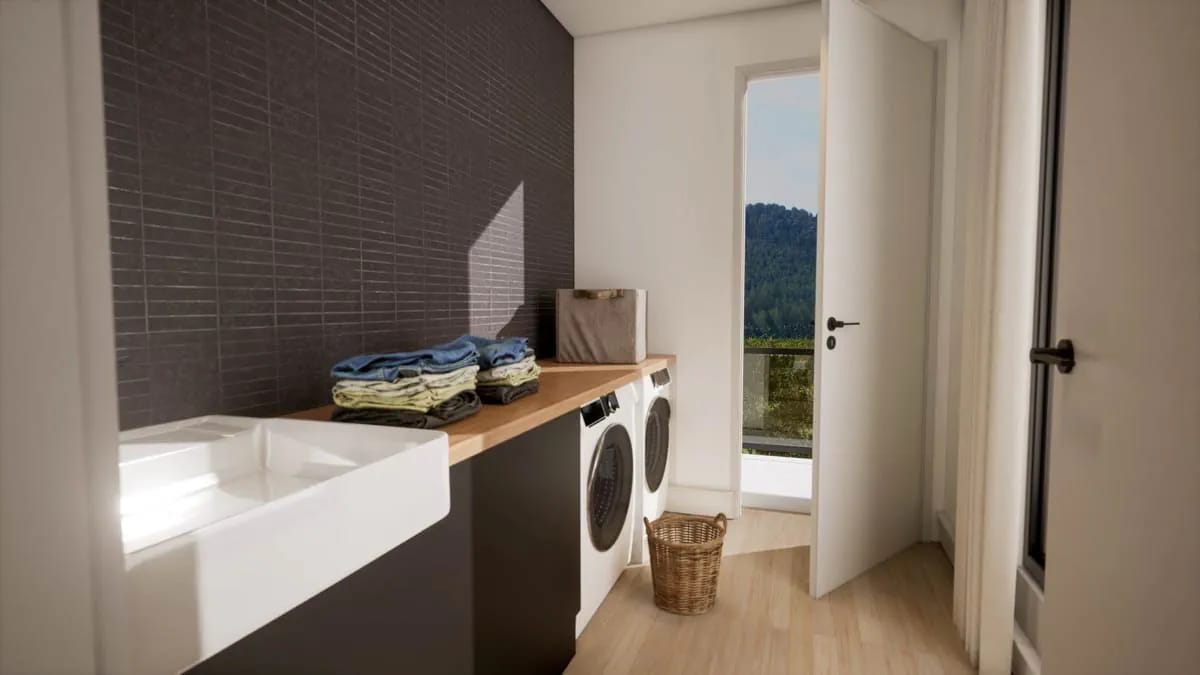Modern laundry room with farmhouse sink, dark tile wall, wood counter, and mountain view