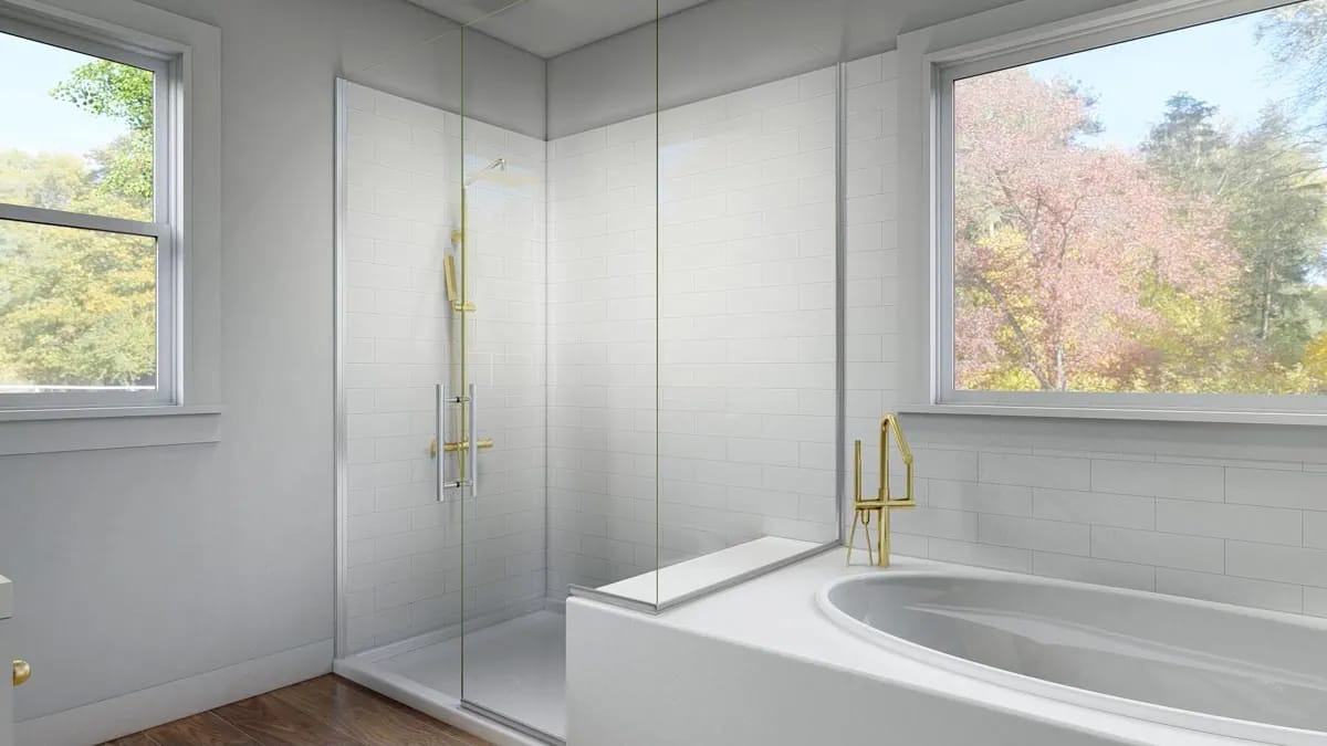 Bright contemporary bathroom with tiled glass shower, soaking tub, brass fixtures, and tree-lined window views